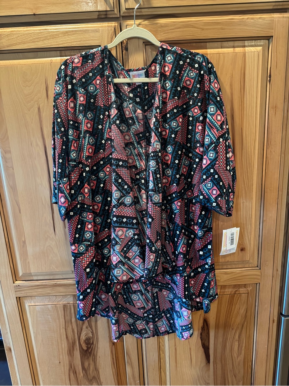 LuLaRoe Black, Pink, Teal Geometric V-Neck cardigan